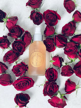 Load image into Gallery viewer, jar of handcrafted toner amidst a bed of rose buds for decoration in michigan