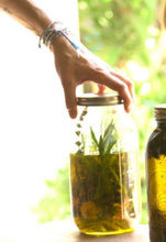 Load image into Gallery viewer, jar of oils and botanicals for mineralizing hair body oil used in treatments at wellness spa poppyandsomeday